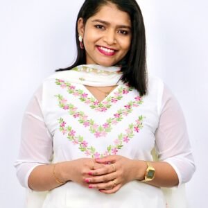 White churidar suit with pink and green floral embroidery – Indian ethnic outfit for women, Kerala style