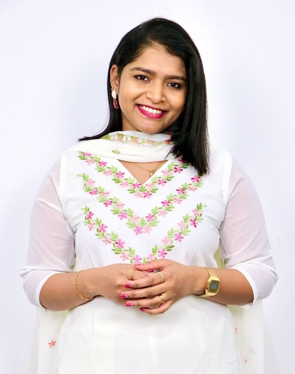 White churidar suit with pink and green floral embroidery – Indian ethnic outfit for women, Kerala style